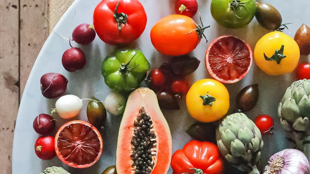 various fresh vegetables and fruits on table